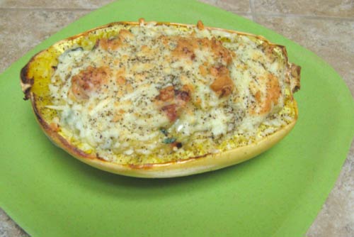 Twice Baked Spaghetti Squash Topped with Cheese.